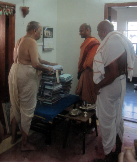 Sri TSR showing the books